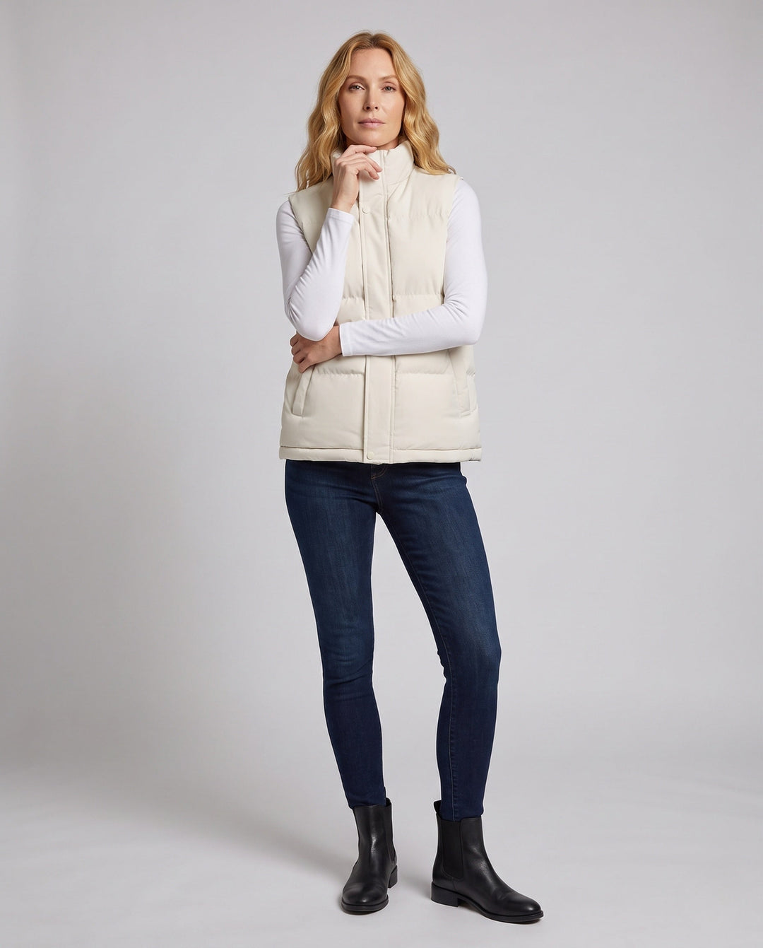 Alfrida sleeveless quilted gilet with high stand collar